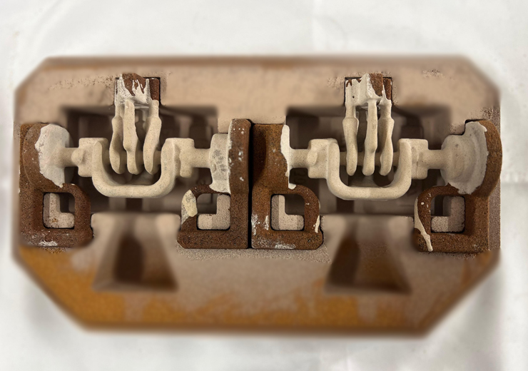 Shell moulding machine producing precision castings at EnGenius Metals